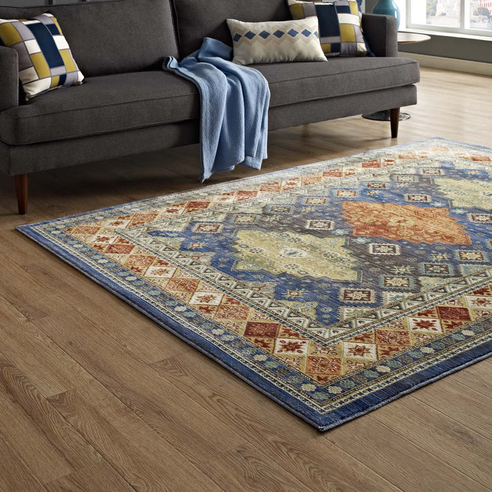 Atzi  Distressed Southwestern Diamond Floral Area Rug